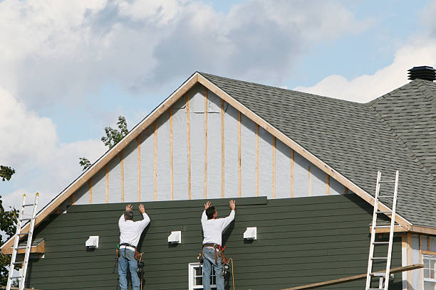 Professional Siding technician working in New Stanton, PA